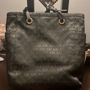 Michael Kors black logo purse.